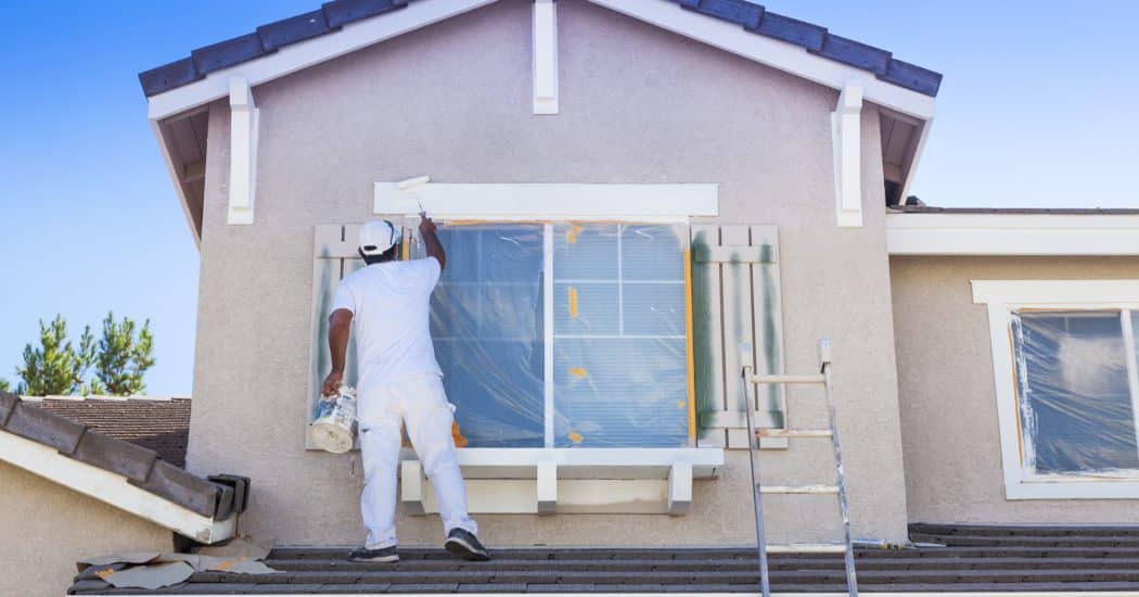 Painting House while the window is covered - Turnkey Painters
